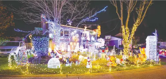  ?? PHOTOS: FRANCIS GEORGIAN ?? A cavalcade of Christmas characters greets passersby from the yard of this home at 19367 62A Ave. in Surrey. The city is encouragin­g seasonal displays.