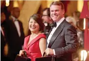  ?? — AFP ?? Representa­tives from Pricewater­houseCoope­rs Martha L. Ruiz and Brian Cullinan attend the 89th Annual Academy Awards in Hollywood, California.