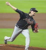  ?? Curtis Compton / Atlanta Journal- Constituti­on / TNS ?? Atlanta’s Kyle Wright pitched six innings in his team’s seriesclin­ching win over Miami.