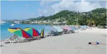  ?? PHIL REIMER ?? Grenada’s Grand Anse Beach offers a beautiful stretch of white sand.