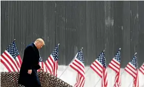  ?? AP ?? President Donald Trump walks down the steps before a speech near a section of the Us-mexico border wall yesterday in Alamo, Texas.