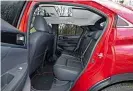  ??  ?? PRACTICALI­TY Eclipse Cross’s rear seats slide, allowing you to prioritise boot capacity or space in the back. The maximum capacity, with the seats folded down, is a modest 653 litres EQUIPMENT Touchpad looks fiddly, but it’s actually quite intuitive,...