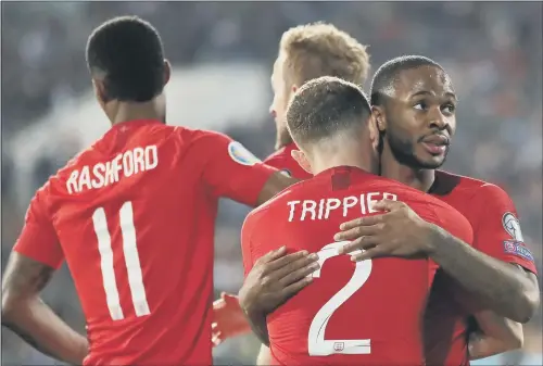  ?? PICTURE: PA ?? DID THEMSELVES PROUD: Raheem Sterling, pictured right looking up at the stands after scoring England’s fourth, and his team-mates stood tall in Sofia on Monday night.