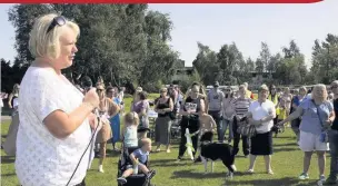  ??  ?? Councillor Maureen Chalmers addresses the crowds at FAMS walk