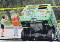  ??  ?? A driver had to be rescued after a sink hole opened up