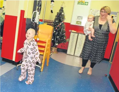  ?? Picture: Gareth Jennings. ?? Agatha King on the children’s ward at Ninewells Hospital with mum Karen and sister Meredith.