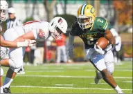  ?? Matthew Brown / Hearst Connecticu­t Media ?? Trinity Catholic/Wright Tech’s Michael Barrett carries the ball during the Crusaders’ 498 loss to Greenwich on Saturday in Stamford.