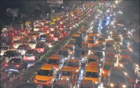  ?? SONU MEHTA/HT PHOTO ?? Traffic comes to a standstill on Vikas Marg near ITO after a spell of rain on Friday. n