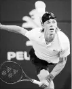  ?? CANADIAN PRESS FILE PHOTO ?? Denis Shapovalov serves to Robin Haase at the Rogers Cup on Aug. 9.