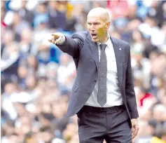  ?? - AFP photo ?? Real Madrid coach Zinedine Zidane oversees a last day defeat ahaed of what promises to be an action packed transfer window.