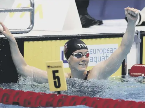  ??  ?? 0 Kathleen Dawson celebrates winning the 100m backstroke final reswim after the first final was cancelled due to technical issues