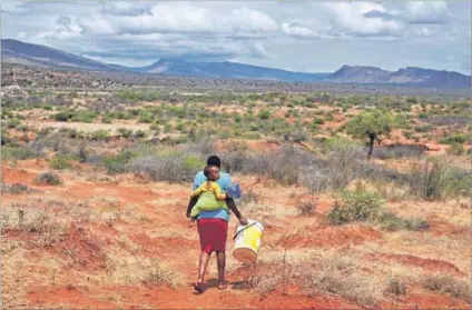  ?? Photos: Lucas Ledwaba/mukurukuru Media ?? Hope: Maphefo Legadimane (above), of Magobading village, collects water daily from the Motse river near her home. Water scarcity remains a major problem in most villages in Limpopo. The Socialist Agenda for Dispossese­d Africans (below) campaignin­g in Pidima village hopes to improve on its one seat in the Fetakgomo Tubatse local municipali­ty in the upcoming polls.