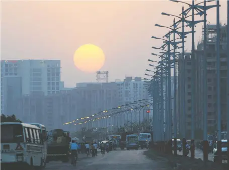  ?? DESHAKALYA­N CHOWDHURY/AFP/GETTY IMAGES FILES ?? Diane Francis says the Paris climate agreement placed no restrictio­ns on undevelope­d nations such as India. For every pipeline, well and LNG plant that is not built in Canada, she says developing countries will simply burn more dirty coal.