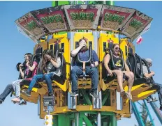  ?? LIAM RICHARDS ?? “Not-so-brave” StarPhoeni­x reporter Matthew Olson experience­d five thrilling rides at the Saskatoon Ex at Prairielan­d Park.