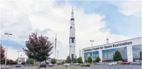  ??  ?? A replica Saturn V rocket can be seen at the U.S. Space &amp; Rocket Center. Inside the neighborin­g Davidson Center for Space Exploratio­n building, a Saturn V is hung for display in sections for visitors to examine.