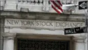  ?? RICHARD DREW — THE ASSOCIATED PRESS FILE ?? This Thursday file photo shows the Wall Street entrance of the New York Stock Exchange. U.S. stocks climbed Wednesday as investors bought shares of companies focused on consumers, including automakers and retailers.