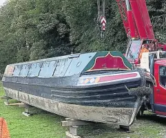  ?? PHOTO: FRIENDS OF CROMFORD CANAL. ?? Birdswood out of the water showing the base of the boat – referred to as the keel.