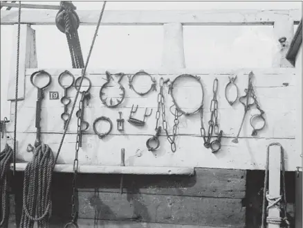  ?? George Grantham Bain Collection / Library of Congress ?? TORTURE IRONS circa 1910-15 aboard a prison ship. The book “Civilizing Torture” looks at America’s history with the practice.