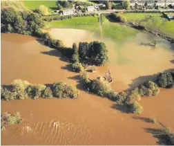  ??  ?? Flooding in Pentrecwrt caused by Storm Callum.