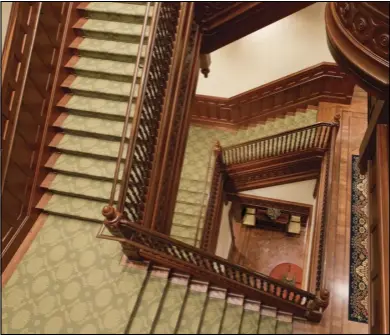  ??  ?? This multi-floor staircase showcases the fine woodwork found throughout the new Provo City Center Temple.