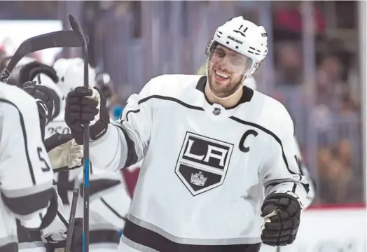  ??  ?? Kings center Anze Kopitar did a lot of scoring — and a lot of celebratin­g — during Thursday’s game against the Avalanche. Kopitar scored four of his team’s seven goals. His fourth of the game was an unassisted tally early in the third period, boosting...