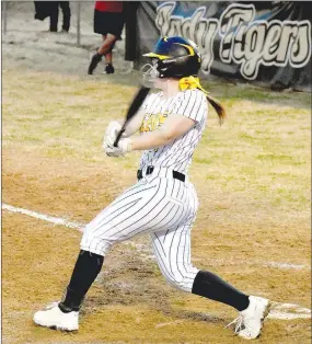  ??  ?? MARK HUMPHREY ENTERPRISE-LEADER Prairie Grove senior Makinsey Parnell went 3-for-4, driving in 4 runs during the Lady Tigers’ 16-1 run-rule victory over Springdale in non-conference softball action on Thursday, March 11.