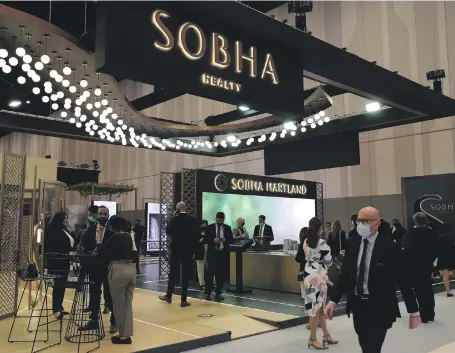  ?? Pawan Singh/The National. ?? Visitors at the Sobha stand on the first day of Cityscape Global at Dubai Exhibition Centre yesterday