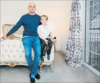  ?? ?? Kris Jakobsen and son Charlie in the master bedroom of their Bonnyrigg home
Picture Andrew Cawley