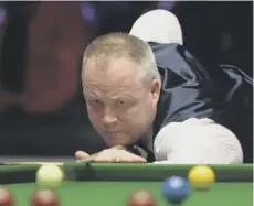  ??  ?? 0 John Higgins has hit form for the World Championsh­ips.