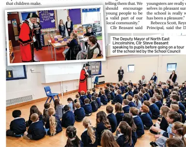  ?? ?? The Deputy Mayor of North East Lincolnshi­re, Cllr Steve Beasant speaking to pupils before going on a tour of the school led by the School Council