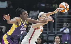  ?? Mark J. Terrill Associated Press ?? FORWARD Nneka Ogwumike rolled her ankle during the Sparks’ blowout loss against the Connecticu­t Sun on Thursday and missed the season f inale Sunday.