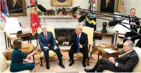  ??  ?? Trump and Pelosi argue while Vice President Pence and Senate Minority Leader Schumer listen at the White House yesterday.