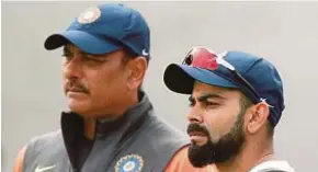  ??  ?? India head coach Ravi Shastri (left) and captain Virat Kohli.