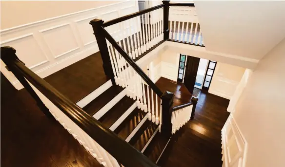  ?? Shuttersto­ck ?? Updating the look and feel of a staircase can add visual appeal to a home.