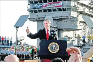  ?? J. Scott Applewhite Associated Press ?? PRESIDENT George W. Bush’s less-than-prescient thumbs up on Iraq war status in May 2003.