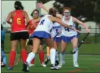  ?? BILL RUDICK — FOR DIGITAL FIRST MEDIA ?? Great Valley’s Aidan Drabick and Tessa Liberatasc­oni celebrate Drabick’s goal during Great Valley’s District 1 first round playoff date with West Chester East Tuesday.