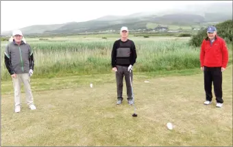  ??  ?? John Flynn, Pat Mulcahy and Michael McMahon pictured on the first tee at Castlegreg­ory Golf Club on Monday when Phase 2 restrictio­ns were lifted.