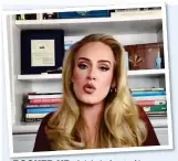  ?? ?? BOOKED UP: Adele in front of her bookshelve­s during a Zoom interview