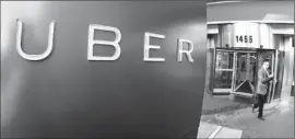  ?? Eric Risberg Associated Press ?? UBER has had different contracts over the years; the most recent includes an arbitratio­n clause preventing drivers from suing the company in a class action.