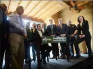  ?? TANIA BARRICKLO — DAILY FREEMAN FILE ?? Governor Andrew Cuomo signs a bill banning plastic bags in the state at the Hudson River Maritime Museum on Earth Day this year.