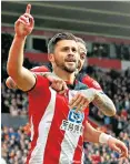  ??  ?? Unconventi­onal: Shane Long found the right touch to score for Southampto­n