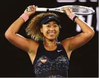  ?? Andy Brownbill / Associated Press ?? Naomi Osaka celebrates after defeating Jennifer Brady for the Australian Open title in 2021.