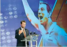  ?? AP Photo/ Chuck Burton ?? ■ Clemson head coach Dabo Swinney speaks at an Atlantic Coast Conference media day July 17 in Charlotte, N.C. Swinney took over the Tigers in the 2008 season and has directed eight straight seasons with 10 or more wins— including the 2016 and 2018 title runs for the program’s first crowns since 1981.