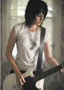  ?? David Moir / Apparition Films 2010 ?? Kristen Stewart plays Joan Jett in the 2010 film “The Runaways.”