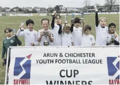  ?? ?? Chichester Colts U9 black team – see the other winners:sussexworl­d.co.uk