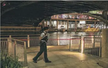  ?? REZIN/ SUN- TIMES PHOTOS | ASHLEE ?? ABOVE: Chicago Police investigat­e along the Riverwalk atWacker and Dearborn where two men were shot early Sunday. RIGHT: Police investigat­e at Douglas and Christiana, where nine people were shot early Sunday.