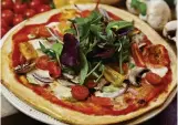  ?? FOTO: TT ?? Pizza bakad i eget kök blir garanterat omtyckt mat.