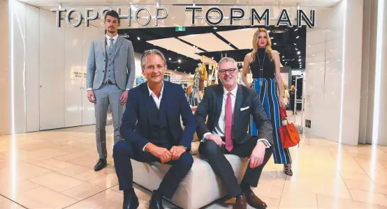  ?? DOOMED: Topshop's Hilton Seskin with Myer’s Daniel Bracken outside the Topshop in the Emporium centre on Lonsdale St in Melbourne. ??