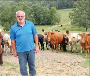  ??  ?? Donny Moore raises crossbred cattle in a cow/calf operation in the Red Oak community near Lake Hamilton in Hot Springs.