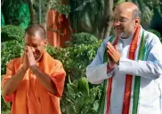  ?? — BIPLAB BANERJEE ?? Uttar Pradesh chief minister Adityanath Yogi with BJP president Amit Shah after a meeting at his residence in New Delhi on Tuesday.